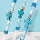 PORTE-CLÉS CROIX EN PIERRE PRÉCIEUSE BOUGIE DE PÂQUES - TURQUOISE