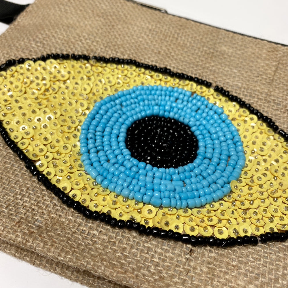 POCHETTE MAL EYE EN PERLES DE JUTE-JAUNE